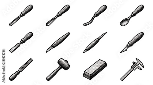Fototapeta Woodworking hand tools collection features chisels gouges and mallets on white background.