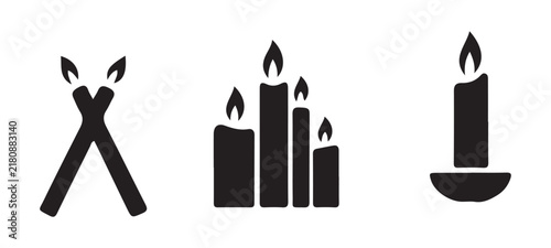 Group of dark silhouette candles and burning torches for atmospheric design.