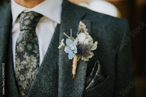 Foto wedding dress and flower buttonhole