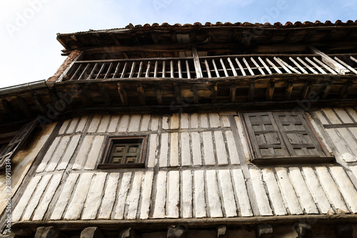 Typical houses with granite stone plinths and upper floors with geometric wooden frameworks and adobe in La Alberca town