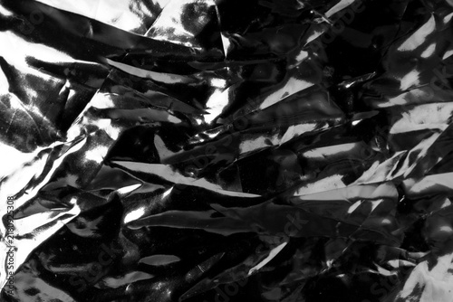 Silver foil textured background, crumpled aluminum pattern