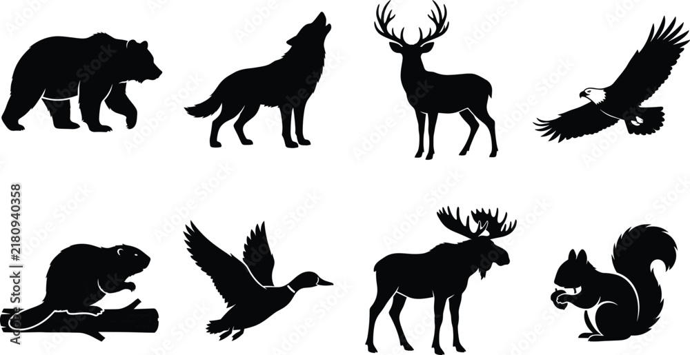 Fototapeta premium Set of North American wild animal silhouettes including bear wolf deer eagle beaver duck moose and squirrel isolated on white