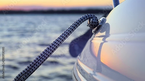 Mooring Rope on Sailboat Hull Detail at Sunset
