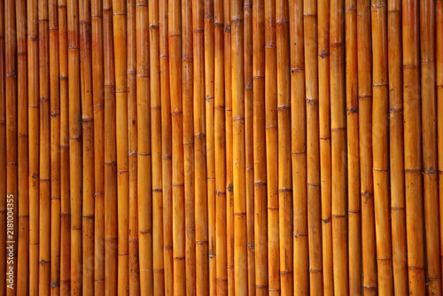 Natural bamboo wall texture showcasing rustic architecture, sustainable materials, and traditional craftsmanship.