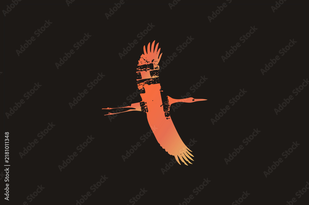Obraz premium Distressed vector cutout of a crane, also called a stork or wader, soaring with outstretched wings. Grunge stencil style with rough feather texture and glowing sunset orange gradient on the lone flyin