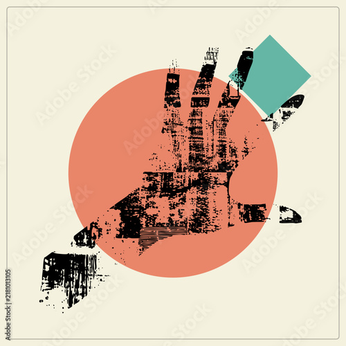 Фотография Grungy black ink palm print of an open hand over a warm disc with teal diamond accent
