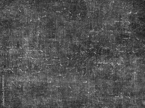 Grungy black surface with numerous white scratches and dust particles, creating a distressed and textured overlay for abstract or vintage designs.