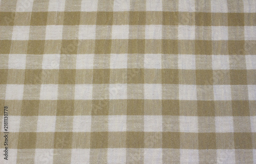 Obraz na płótnie Texture of wrinkled gold and white plaid linen like cloth