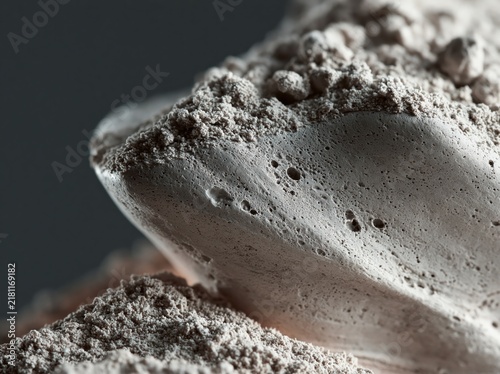 Close-up macro shot of porous volcanic pumice stone with fine ash