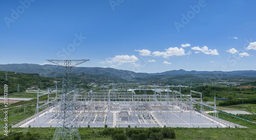 Konstfotografi Aerial View of High Voltage Substation with Energy Storage Stations in Valley