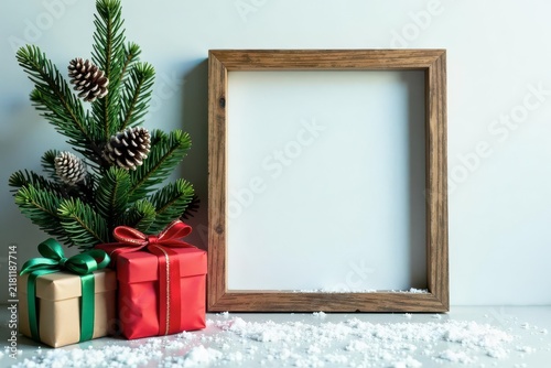 A Festive Winter Scene with Presents and an Empty Frame Ready for Your Holiday Message