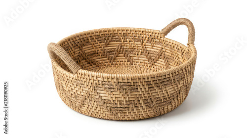 Woven Rattan Basket with Handles on White Background.