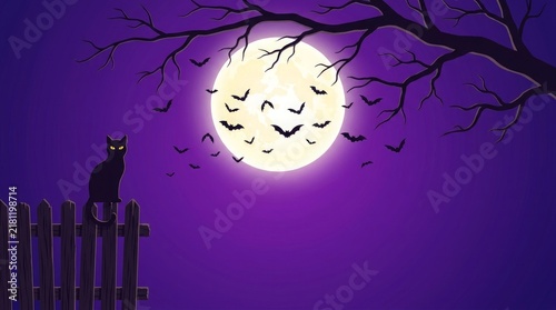 Black cat sitting on wooden fence with bats flying near full moon with bare tree branches