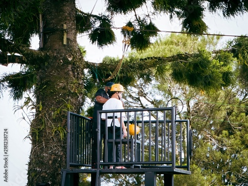 Young boy trying the flying fox zip line in Malaysia