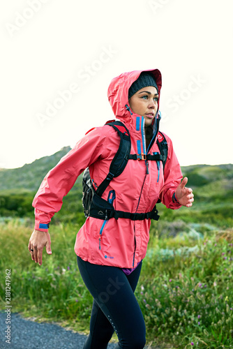 Fotografie Fitness, serious and runner in nature with workout, cardio and stamina exercise in physical activity