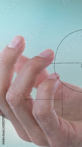 Animation of mathematical equations floating over close up of a hand against gradient background