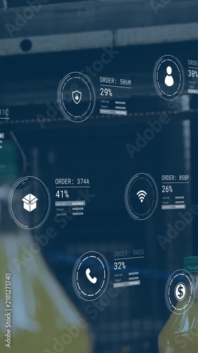 Animation of data processing against modern machinery operating at a factory