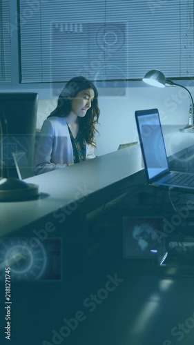 Animation of round scanners and data processing against diverse people working till late at office