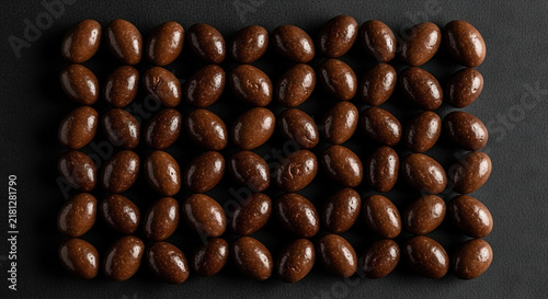 Glossy Brown Chocolate Balls on Dark Background