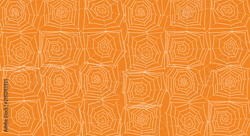 Seamless pattern with white spider webs on orange background