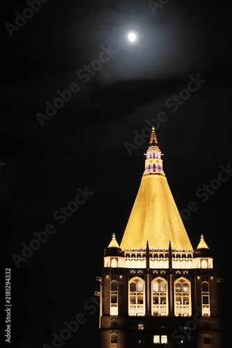 Bild auf Leinwand New york city landmark building lit up at night with moon