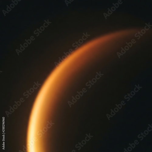Glowing orange planetary atmospheric crescent arc illuminated against the dark void of deep space astronomy photography.