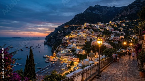 scenic hillside town evening view with lit street lamps background