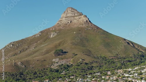 Scenic view of Lions Head mountain towering over residential Cape Town houses.