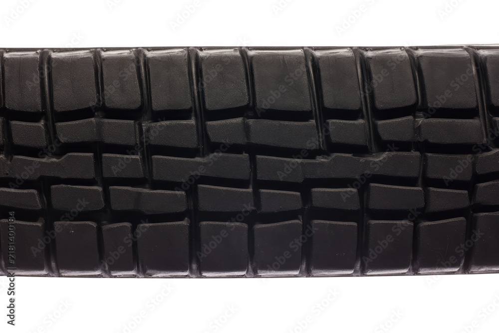Fototapeta premium Black rubber vehicle tire tread texture, close up of automotive wheel surface pattern.