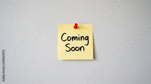 Konstfotografi Yellow sticky note with coming soon handwritten text