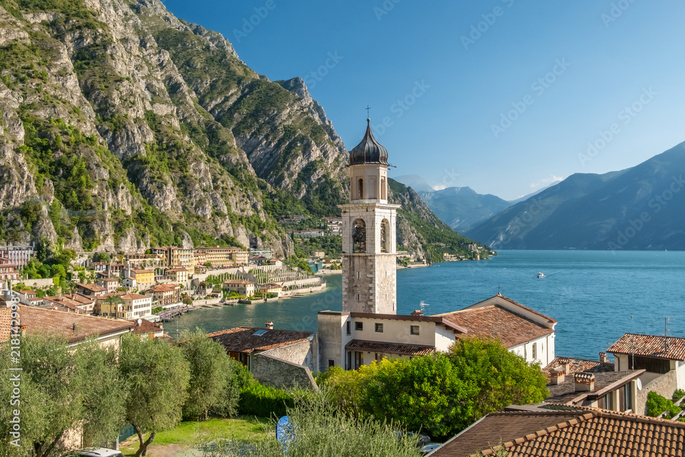 Obraz premium Old town harbor and lakefront view, Limone sul Garda, Italy
