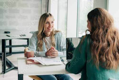 A female HR manager is interviewing a job candidate.