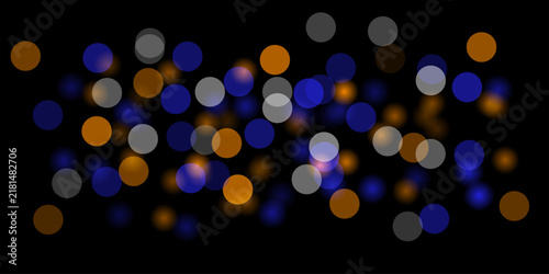 Abstract blue and orange glowing bokeh on black background