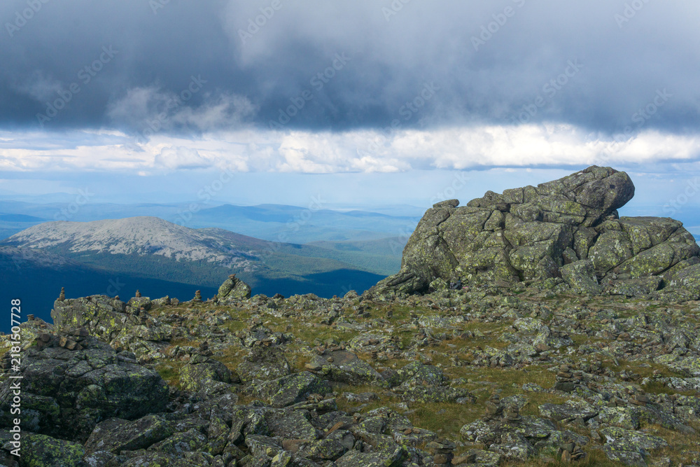 Obraz premium Mountain landscape with clouds in the sky. Ural, Russia.