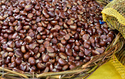 Chestnuts and chestnuts bags close-up
