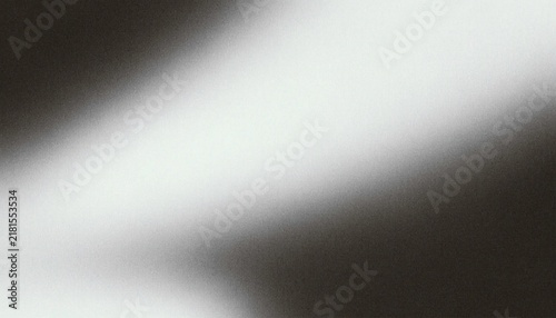Abstract grainy black and white background with diagonal gradient light streak, retro film noise texture and dramatic monochrome aesthetic