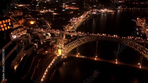 Sweeping Flyover of Porto's Dom Luis I Bridge at Night