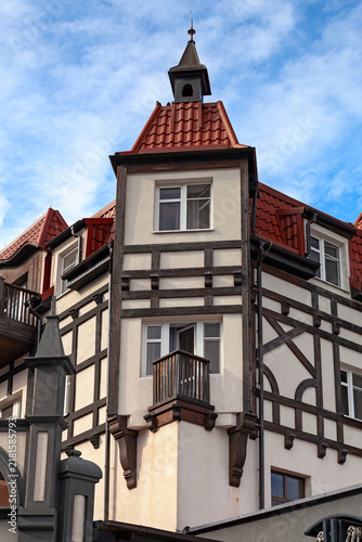 Traditional Fachwerk (half-timbered) house with tower in the historic old town