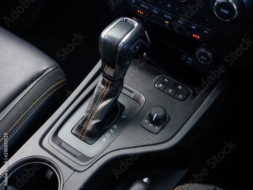 Принти на полотні Modern car interior shows gear shift knob