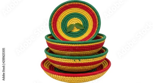 Stack of vibrant red, green, and yellow woven baskets with a small green leaf accent.
