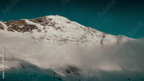 Canvas Print Majestic Snow Covered Mountain Peak in Winter
