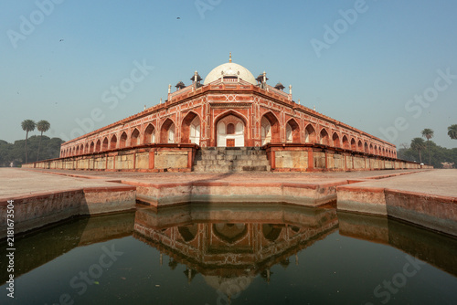 Photography Humayun Tomb reflected in a garden pool in Delhi