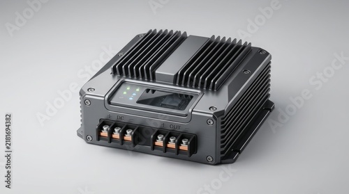 Solar charge controller unit with ribbed metallic heatsink casing rests on a smooth studio surface, displaying durable electronic design.