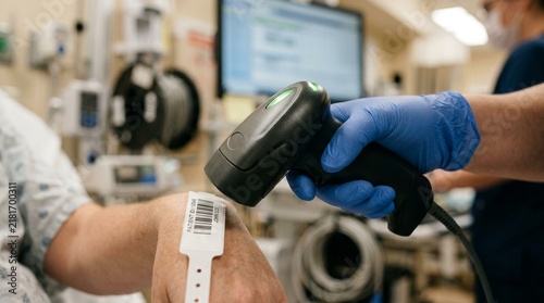 Nurse pausing after a successful scanner beep – Macro Close-Up, Hospital Medication Safety