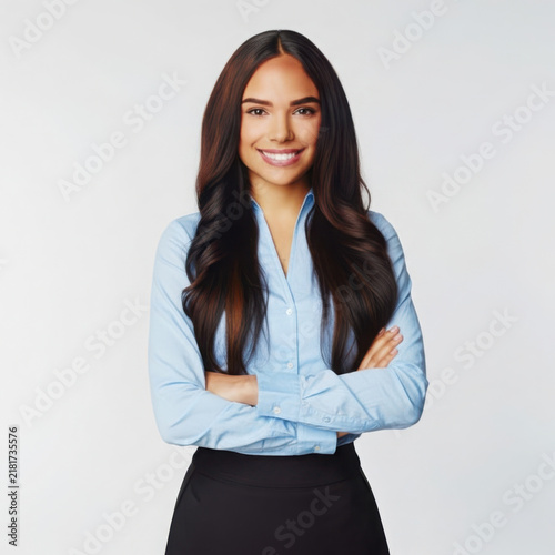 Smiling businesswoman confident professional with arms crossed in professional attire