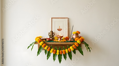 Minimal prayer shelf with marigolds and copy space