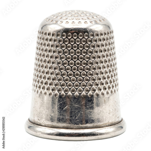 Obraz na płótnie Silver metal sewing thimble with dimpled pattern