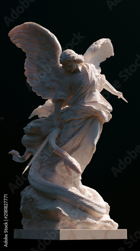 Winged Angel Statue on Dark Background
