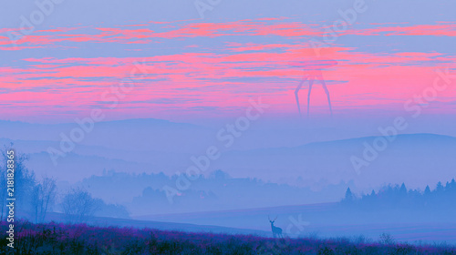Giant Monster Emerging Through Mist Under Pink Sky 