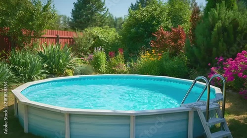 Summer hot vibe lifestyle. A vivid outdoor scene features a round, blue swimming pool surrounded by lush greenery and colorful flowers. The pool is in the center of the image.